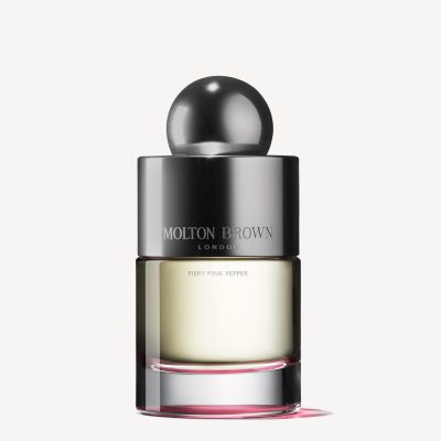 A 100ml bottle of Molton Brown Fiery Pink Pepper EDT for Men and Women features a metallic cap and transparent glass displaying light yellow liquid.