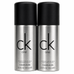 Two silver 150 ml cans of Calvin Klein CK One deodorant natural spray with black caps are placed side by side against a white background.
