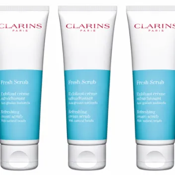 Three 50ml tubes of Clarins Fresh Scrub Refreshing Cream Scrub are displayed upright against a white background.