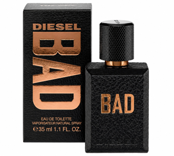 A 100ml bottle of Diesel Bad EDT Spray for Men is displayed beside its matching box, both in textured black with metallic copper lettering.