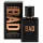 A 100ml bottle of Diesel Bad EDT Spray for Men is displayed beside its matching box, both in textured black with metallic copper lettering.