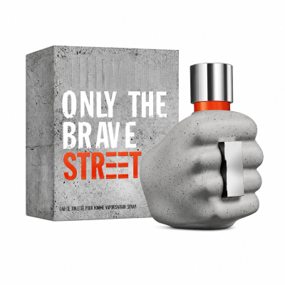A bottle shaped like a clenched gray fist stands beside a matching box labeled "Diesel Only The Brave Street EDT Spray for Men, 50ml" in bold white and orange letters.