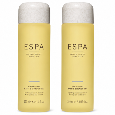 Two yellow bottles of ESPA Energising Bath & Shower Gel, each 250ml, stand side by side against a white background.