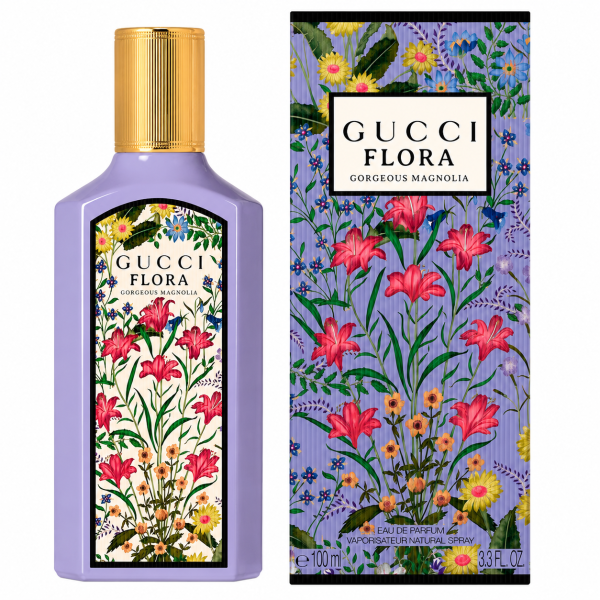 A bottle and box of Gucci Flora Gorgeous Magnolia perfume, both featuring a colorful floral design with pink, yellow, and blue flowers on a light purple background.