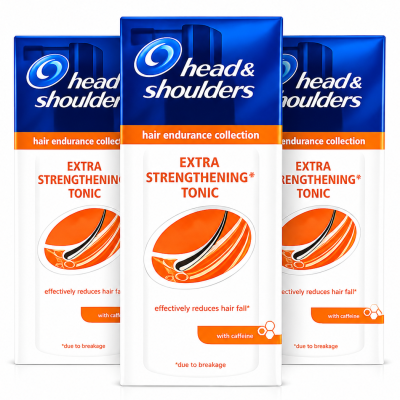 Three bottles of Head & Shoulders Extra Strengthening Tonic, hair endurance collection, with caffeine, for reducing hair fall due to breakage, standing side by side against a white background.