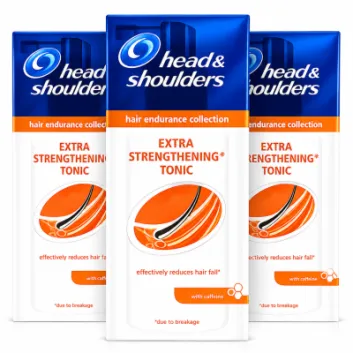 Three bottles of Head & Shoulders Extra Strengthening Tonic, hair endurance collection, with caffeine, for reducing hair fall due to breakage, standing side by side against a white background.