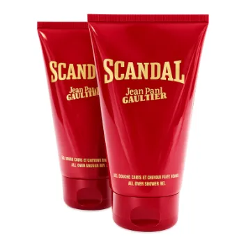 Two red tubes of Jean Paul Gaultier Scandal all over shower gel are displayed standing upright, with bold yellow text on the packaging.