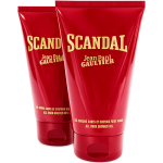 Two red tubes of Jean Paul Gaultier Scandal all over shower gel are displayed standing upright, with bold yellow text on the packaging.