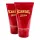 Two red tubes of Jean Paul Gaultier Scandal all over shower gel are displayed standing upright, with bold yellow text on the packaging.