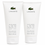 Three white tubes of Lacoste L.12.12 Blanc Shower Gel Body Wash, each 150 ml, are standing upright side by side on a white background.