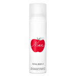 A white spray can featuring a red apple graphic labeled "Nina," with the brand name "Nina Ricci" below, reading "Déodorant Naturel Spray." Product: 3x Nina Ricci Nina Deodorant Spray for Her 150ml.