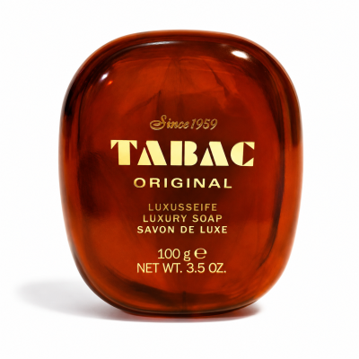 A brown bar of Tabac Original luxury soap, 100g (3.5 oz.), with gold lettering and product information on the front.