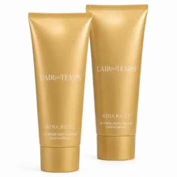 Three gold tubes of Nina Ricci L’Air du Temps Shower Gel, each 200ml, stand upright on a white background.