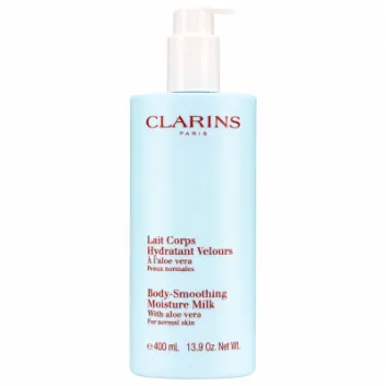 A set of three 400 ml bottles of Clarins Body Smoothing Moisture Milk with aloe vera for normal skin, each featuring a white pump dispenser and red text on a light blue container.