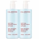 Three bottles of Clarins Body Smoothing Moisture Milk With Aloe Vera, each 400 ml, are displayed side by side against a white background.