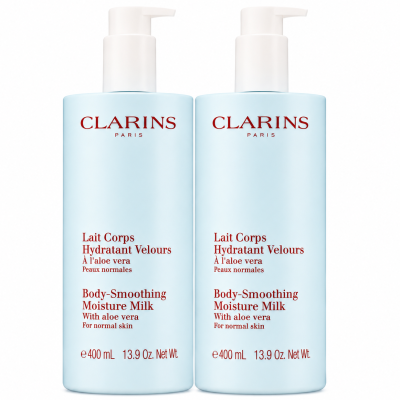 Three bottles of Clarins Body Smoothing Moisture Milk With Aloe Vera, each 400 ml, are displayed side by side against a white background.