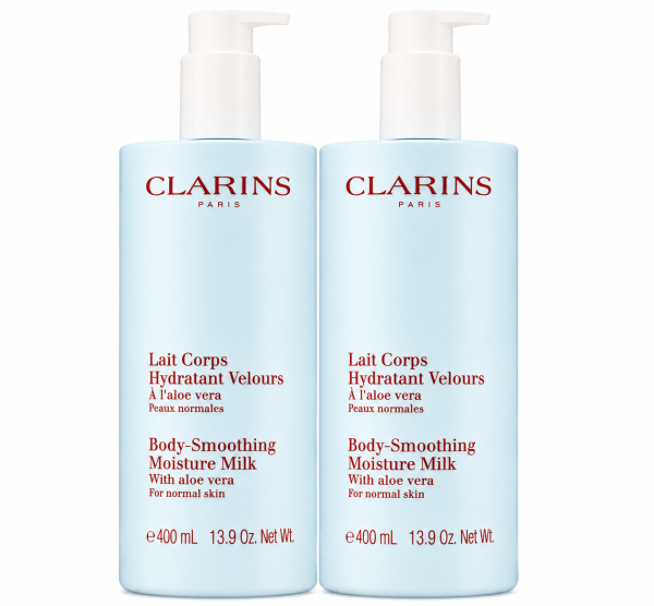 Three bottles of Clarins Body Smoothing Moisture Milk With Aloe Vera, each 400 ml, are displayed side by side against a white background.