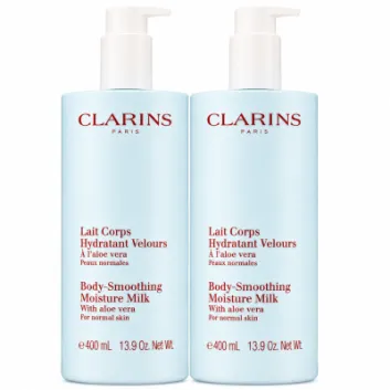 Three bottles of Clarins Body Smoothing Moisture Milk With Aloe Vera, each 400 ml, are displayed side by side against a white background.