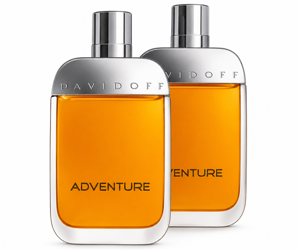 Two bottles of 2x Davidoff Adventure EDT Spray for Men, 100ml, featuring silver caps and orange liquid, are positioned side by side on a white background.