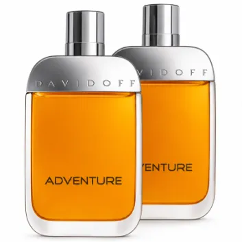 Two bottles of 2x Davidoff Adventure EDT Spray for Men, 100ml, featuring silver caps and orange liquid, are positioned side by side on a white background.
