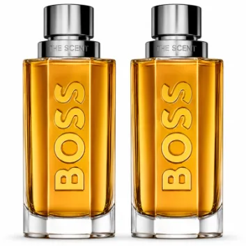 Two identical bottles of 2x Hugo Boss The Scent EDT for Men, 200ml each, filled with amber liquid and topped with silver caps, are placed side by side on a white background.