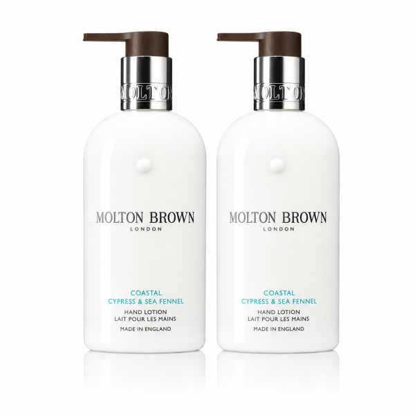Two white pump bottles of Molton Brown Coastal Cypress & Sea Fennel Bath and Shower Gel (300ml each, unisex), each labeled with product and brand details in black and blue text.