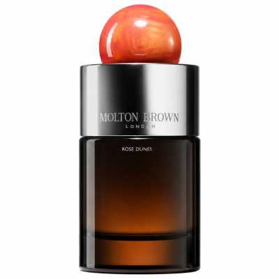 A 100ml bottle of Molton Brown Rose Dunes EDP (Unisex) featuring brown glass, a metallic cap, and a round, marble-like pink and orange top, set against a white background.