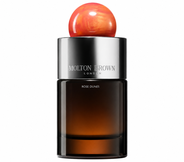 A 100ml bottle of Molton Brown Rose Dunes EDP (Unisex) featuring brown glass, a metallic cap, and a round, marble-like pink and orange top, set against a white background.