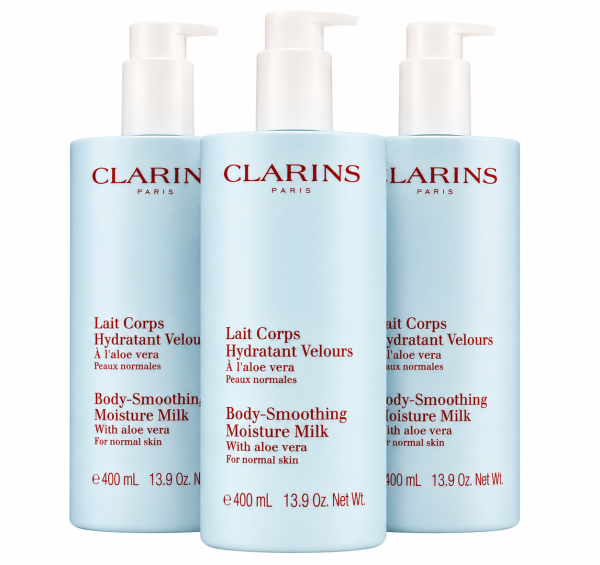 Three bottles of 3x Clarins Body Smoothing Moisture Milk With Aloe Vera 400ml are standing side by side against a white background.