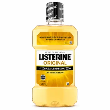 A 500ml bottle of Listerine Original Antiseptic Mouthwash, featuring a yellow liquid, Indonesian labeling, and a black-and-white cap.