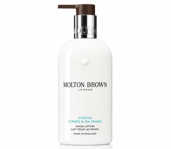 A pair of white bottles of Molton Brown Coastal Cypress & Sea Fennel Bath and Shower Gel (300ml, unisex) with black and silver accents, photographed on a white background.