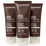 Three brown tubes of 3x ManCave Cedarwood Shower Gel, Man Cave, 200ml are standing upright side by side on a white background.