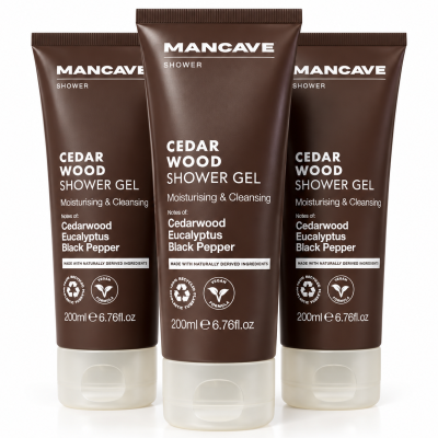 Three brown tubes of 3x ManCave Cedarwood Shower Gel, Man Cave, 200ml are standing upright side by side on a white background.