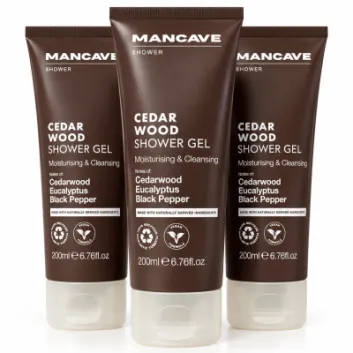 Three brown tubes of 3x ManCave Cedarwood Shower Gel, Man Cave, 200ml are standing upright side by side on a white background.