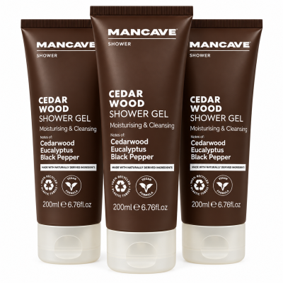 Three brown 200ml tubes of 3x ManCave Cedarwood Shower Gel, Man Cave, with white text highlighting cedarwood, eucalyptus & black pepper notes, upright on a white background.
