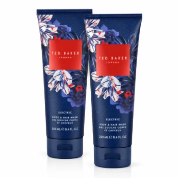 Three bottles of Ted Baker Fusion Electric Body & Hair Wash, 250ml each, featuring a blue floral design with a red label, are standing upright on a white background.