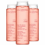 Three 200ml bottles of Clarins Cleansing Micellar Water with pink liquid and white screw caps.