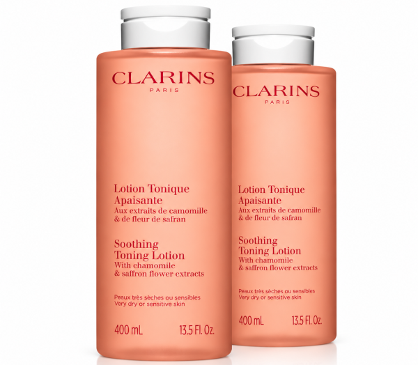 Two bottles of pink 3x Clarins Soothing Toning Face Lotion 400ml for very dry or sensitive skin, each with a white flip-top cap.