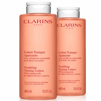 Two bottles of pink 3x Clarins Soothing Toning Face Lotion 400ml for very dry or sensitive skin, each with a white flip-top cap.