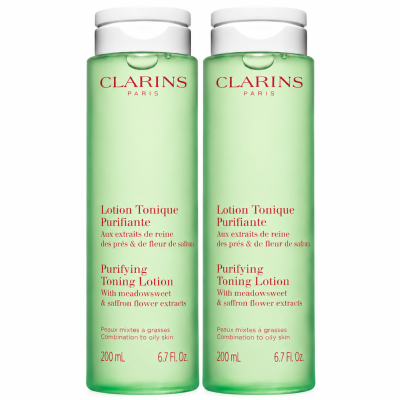 Two identical 200ml bottles of green 3x Clarins Purifying Toning Face Lotion.