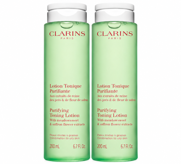 Two identical 200ml bottles of green 3x Clarins Purifying Toning Face Lotion.