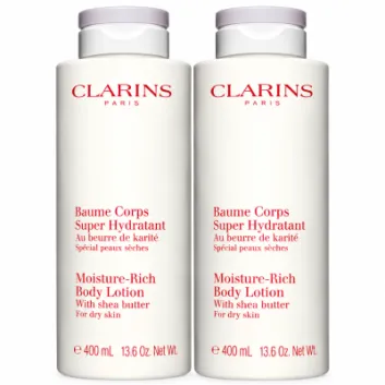 Two identical 400ml bottles of Clarins Moisture-Rich Shea Butter Body Lotion with white screw-top caps.